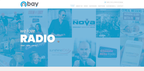 A website homepage featuring a collage of radio-related images and text. Prominent text states 'we love RADIO', with images of radio hosts and logos from various radio stations. The background has a light blue tint.